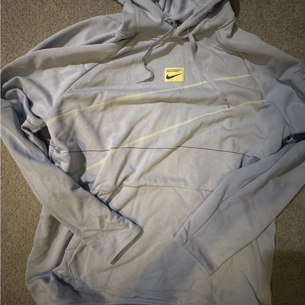 Nike Sky Blue Apparel with Yellow Accents